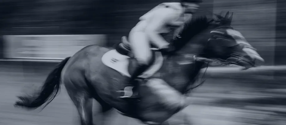 Racehorses at full gallop on a UK racecourse